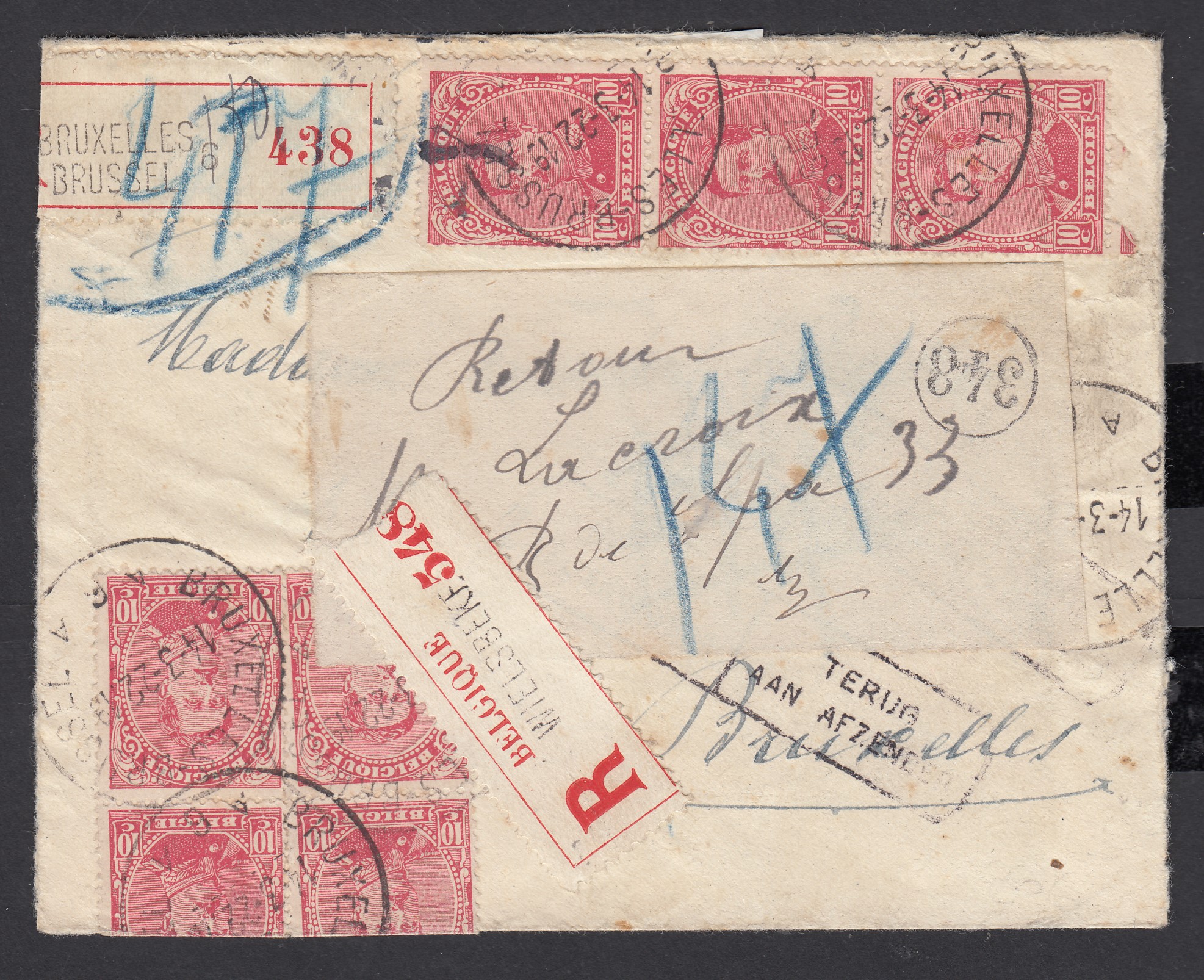 138 x7 ( bloc de 4 +bande de 3) sur lettre en recommandé de et vers BXL le 14.III.1922. Retour, papillon avec la nouvelle adresse +nouvelle étq.de rec.  Griffe bilingue « Non réclamé » avec man.du facteur au verso.