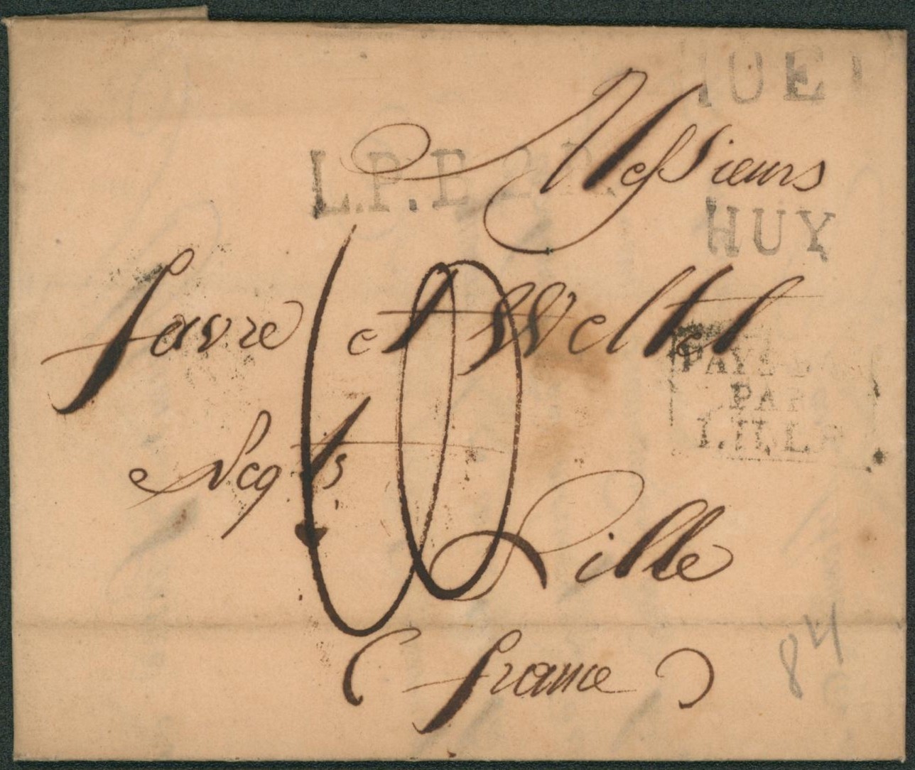 LAC datée de Huy (1828) obl linéaire noir HUY & HOEI, griffe de rayon L.P.B.2.R. , port "10" > Lille, négociant.
